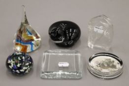 A small quantity of glass paperweights.