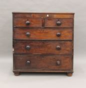 A Victorian mahogany chest of drawers. 93 cm wide.