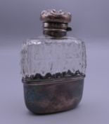 A silver and crystal hip flask. 9.5 cm high.