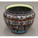 An Oriental cloisonne planter. 27 cm diameter.