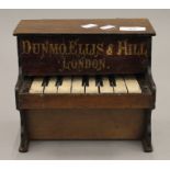 A rare toy sample Dunmo Ellis Hill toy piano, circa 1900. 20.5 cm wide.