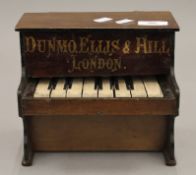 A rare toy sample Dunmo Ellis Hill toy piano, circa 1900. 20.5 cm wide.