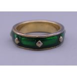 A Monet enamel ring. Ring size M/N.