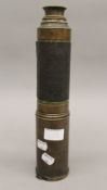 A Victorian four-drawer brass marine telescope. 32.5 cm long when closed.
