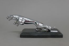 A chrome Jaguar car mascot, mounted on a plinth base. 19.5 cm long overall.