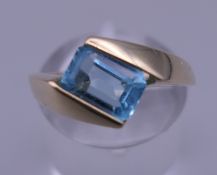 A 9 ct gold topaz ring. Ring size L/M.