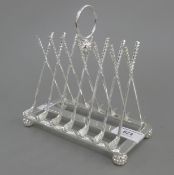 A silver plated golf club form toast rack. 15.5 cm long.