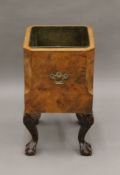 An early 20th century brass lined burr walnut log bucket. 48 cm high.