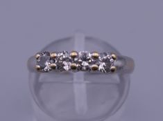 An 18 ct gold diamond ring set with 1/2 carat of diamonds. Ring size K. 3.6 grammes total weight.