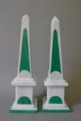 A pair of malachite inset obelisks. 42 cm high.