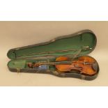 A vintage cased violin.