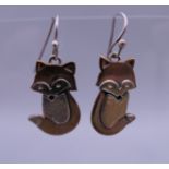 A pair of silver earrings formed as foxes. 2.5 cm high.