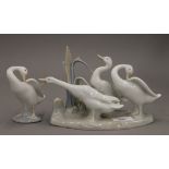 A Lladro geese group and a single goose. The former 14 cm high.