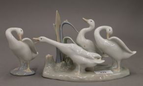 A Lladro geese group and a single goose. The former 14 cm high.