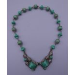 An Eastern dress necklace. 43 cm long.