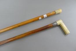 Two 19th century ivory handled walking sticks. The largest 116 cm long.