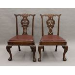 A pair of Hepplewhite style mahogany dining chairs. 60 cm wide.