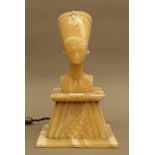 A 1930s Art Deco Egyptian Revival alabaster lamp modelled on an ancient image of Queen Nefertiti,