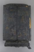 A 19th century Chinese lacquered shrine frame. 31 cm high.