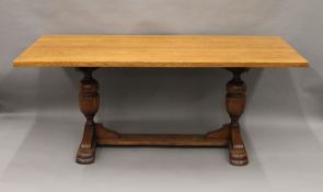 An oak refectory table. 183 cm long x 83.5 cm wide.