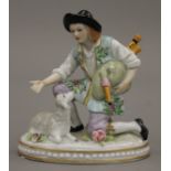 A Sitzendorf porcelain model of a shepherd. 9 cm high.