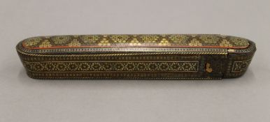 A 19th century Eastern inlaid scribes box. 23 cm long.