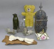 A quantity of various items, including a teddy bear. etc.