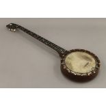 A Douglas and Co banjo with inlaid back.