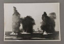 An album of various Naval pre WWII photographs and postcards, and a quantity of related ephemera.