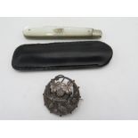 Victorian hallmarked silver flower basket brooch, Birmingham 1897 and a Geo. V mother of pearl