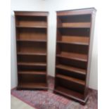 Pair of mahogany effect bookcases, with adjustable shelves, on bracket feet (W77cm x H184cm x D29cm)
