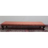 Victorian mahogany long kneeler footstool with nailed upholstered top, on four cabriole legs (