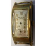 1930's Patek Philippe manual wound wrist watch. Rectangular gold plated case, snap on curved