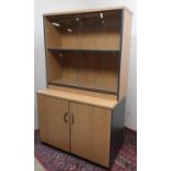 Modern beech finish office bookcase enclosed by two glazed doors (W95cm x H89cm x D36cm), and a