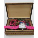 Marea quartz wrist watch, and a collection of costume jewellery beads, brooches etc in wooden