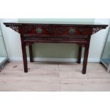 Chinese altar table, overhanging top with two drawers with carved detail above similar frieze on