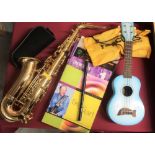 Sonata alto saxophone in case, Carla ukulele, Hercules saxophone stand etc