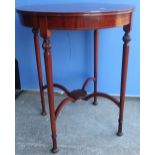 Mahogany inlaid occasional table on four supports with fluted detail an X shaped cross stretcher,