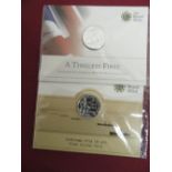 Royal Mint 2013 Timeless First UK £20 Fine Silver Coin and similar 2014 Outbreak Fine Silver Coin,