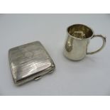 Geo. V hallmarked engine turned silver rectangular cigarette case, Birmingham 1916, and a small mug,