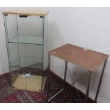 Contemporary glazed display cabinet with two shelves on chromed metal stand (W47cm x D37cm x H175cm)