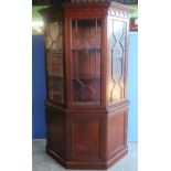 Large reproduction mahogany bow front cabinet with single glazed cupboard door above single panelled