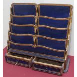 Blue painted stationary rack, with divisions above two shelves, blue painted with gilt detail (W50cm