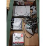 Sony PlayStation with controller and various games including Golf PGA Tour, Brian Lara Cricket etc