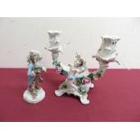 19th C Sitzendorf porcelain Rococo style two branch candelabra and a Meissen monkey band figure (2)