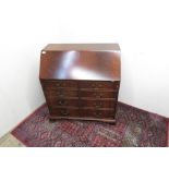 Modern mahogany bureau with full front above two drawers and two faux drawer cupboard doors on