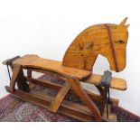 Craftsman constructed rocking horse on swing base, H93cm