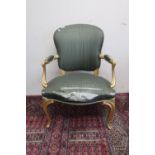 20th C French style giltwood framed open armchair with silk work upholstered back, seat and arms, on