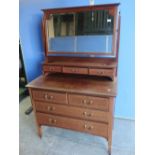 Edwardian mahogany inlaid dressing chest with raised mirror back above three short drawers to the