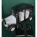 A painted wooden model of a pre WWII London Taxi H42cm D23cm L72cm